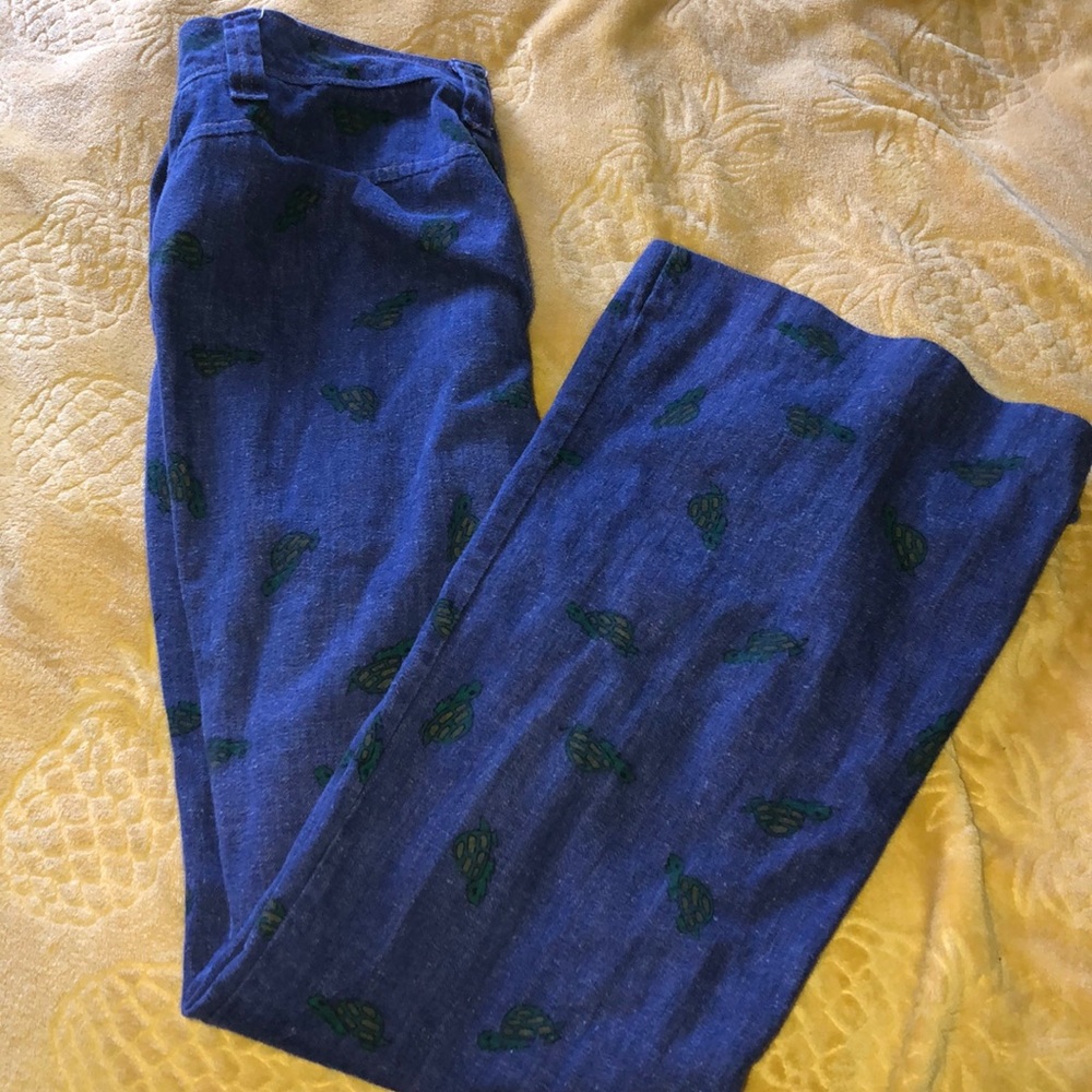 bootcut jeans with turtles imprinted on them
